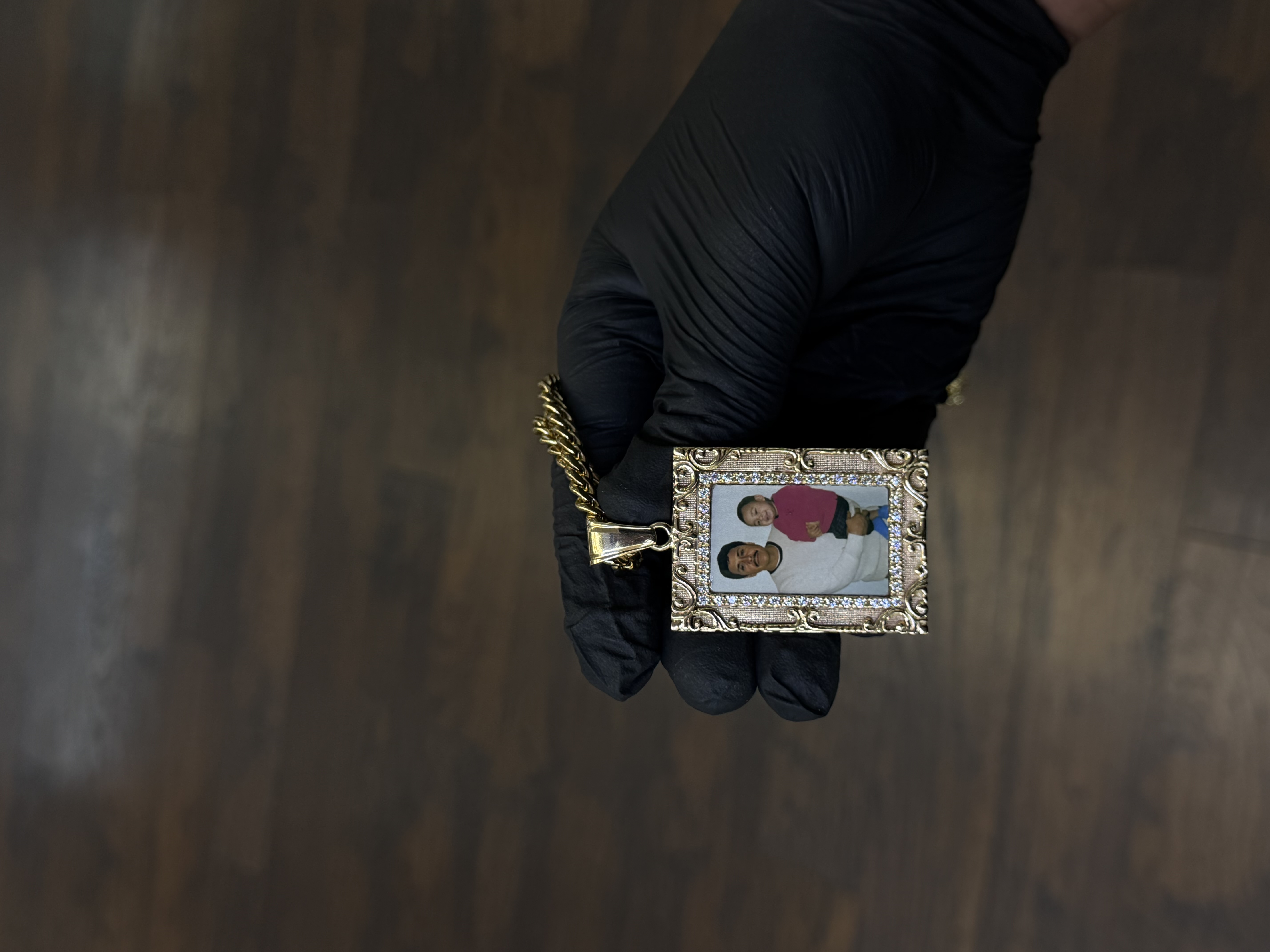 Custom photo pendant in an iced gold frame